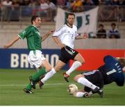 5 June 2002; Robbie Keane, Republic of Ireland, has his shot saved by Germany goalkeeper Oliver Khan. FIFA World Cup Finals, Group E, Republic of Ireland v Germany, Ibaraki Stadium, Ibaraki, Japan. Picture credit: David Maher / SPORTSFILE