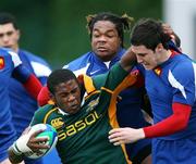 9 April 2007; Wilton Pietersen, South Africa, is tackled by Maxime Machenaud and Mathieu Bastareaud, France. IRB U19 World Cup, Round 2, South Africa v France, Ravenhill Park, Belfast, Co. Antrim. Picture credit: Oliver McVeigh / SPORTSFILE