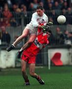 14 November 1999; Mark Milham of Kildare in action against Paul McFlynn of Derry during the Church & General National Football League match between Kildare and Derry at St Conleth's Park in Newbridge, Kildare. Photo by Damien Eagers/Sportsfile