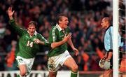 10 November 1997; Tony Cascarino of Republic of Ireland celebrates his equalising goal with David Kelly, 14, during the FIFA World Cup 1998 Group 8 Qualifier match between Republic of Ireland and Romania at Lansdowne Road in Dublin. Photo by David Maher/Sportsfile