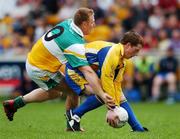 15 April 2007; Stuart Daly, Roscommon, in action against Neville Coughlan, Offaly. Allianz National Football League, Division 2A, Offaly v Roscommon, O'Connor Park, Tullamore, Co. Offaly. Picture credit; Brian Lawless / SPORTSFILE