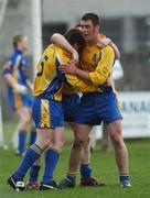 15 April 2007; Roscommon players, from left, Robbie Kelly, Stuart Daly, and Brian Mullins, celebrate at the final whistle. Allianz National Football League, Division 2A, Offaly v Roscommon, O'Connor Park, Tullamore, Co. Offaly. Picture credit; Brian Lawless / SPORTSFILE
