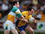 15 April 2007; Enda Kenny, Roscommon, in action against Joe Quinn, Offaly. Allianz National Football League, Division 2A, Offaly v Roscommon, O'Connor Park, Tullamore, Co. Offaly. Picture credit; Brian Lawless / SPORTSFILE