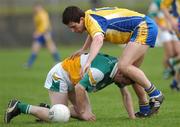 15 April 2007; Karol Mannion, Roscommon, in action against Ger Rafferty, Offaly. Allianz National Football League, Division 2A, Offaly v Roscommon, O'Connor Park, Tullamore, Co. Offaly. Picture credit; Brian Lawless / SPORTSFILE