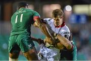 18 October 2014; Louis Ludik, Ulster, is tackled by Vereniki Goneva, left, and Fraser Balmain, Leicester Tigers. European Rugby Champions Cup 2014/15, Pool 3, Round 1, Leicester Tigers v Ulster, Welford Road, Leicester, England. Picture credit: Ramsey Cardy / SPORTSFILE