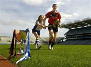 16 April 2007; Down captain Teresa McGowan is tackled by Waterford captain Sally O'Grady, left, at a photocall ahead of the Camogie Division 2 and 3 National League finals. Croke Park, Dublin. Picture credit: Pat Murphy / SPORTSFILE