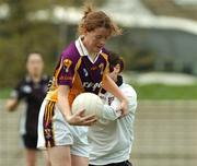 21 April 2007; Kate Kelly, Wexford, goes past Sligo goal-keeper Katrina Connolly to score a goal. Suzuki Ladies National Football League Division 2 Semi-Final, Sligo v Wexford, Banagher, Co. Offaly. Picture credit; Matt Browne / SPORTSFILE