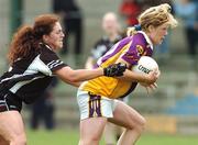 21 April 2007; Michelle Hearne, Wexford, in action against Fiona Maye, Sligo. Suzuki Ladies National Football League Division 2 Semi-Final, Sligo v Wexford, Banagher, Co. Offaly. Picture credit; Matt Browne / SPORTSFILE