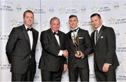 24 October 2014; Kerry footballer James O'Donoghue is presented with his 2014 GAA GPA All-Star award by Uachtarán Chumann Lúthchleas Gael Liam Ó Néill, Dessie Farrell, Chief Executive of the Gaelic Players Association, and Dave Sheeran, Managing Director of Opel Ireland. GAA GPA All-Star Awards 2014 Sponsored by Opel. Convention Centre, Dublin. Picture credit: Brendan Moran / SPORTSFILE