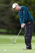 25 April 2007; James Patterson, of the Royal Belfast Academical Institute, watches his putt on the 18th green on his schools way to victory in the Irish Schools Golf Strokeplay Championship. Patterson finished with the lowest score of 74. Lucan Golf Club, Co. Dublin. Picture credit: Brendan Moran / SPORTSFILE