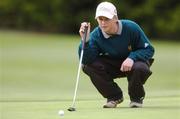 25 April 2007; James Patterson, of the Royal Belfast Academical Institute, lines up a putt on the 18th green on his schools way to victory in the Irish Schools Golf Strokeplay Championship. Patterson finished with the lowest score of 74. Lucan Golf Club, Co. Dublin. Picture credit: Brendan Moran / SPORTSFILE
