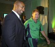 25 April 2007; Out-going coach Adrian Birrel, right, makes his way to the stage with incoming coach Phil Simmons as he officialy stood down as team coach at the official welcome home reception for the Ireland cricket team. Shelbourne Hotel, St. Stephen's Green, Dublin. Picture credit: Pat Murphy / SPORTSFILE