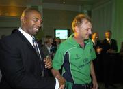 25 April 2007; Out-going coach Adrian Birrel, right, makes his way to the stage with incoming coach Phil Simmons as he officialy stood down as team coach at the official welcome home reception for the Ireland cricket team. Shelbourne Hotel, St. Stephen's Green, Dublin. Picture credit: Pat Murphy / SPORTSFILE