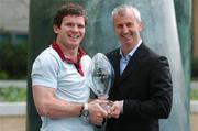 25 April 2007; Ireland and Leinster centre Gordon D'Arcy is presented with the BT IRUPA Players' Player of the Year by Niall Woods, Chief Executive, IRUPA, at a photocall ahead of the IRUPA Awards. IRUPA Awards Photocall, BT Ireland Headquarters, Grand Canal Plaza, Dublin. Picture credit: Brendan Moran / SPORTSFILE