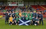 25 October 2014; The Scotland squad celebrate with the cup. 2014 U21 Hurling/Shinty International, Ireland v Scotland, Pairc Esler, Newry, Co. Down. Picture credit: Matt Browne / SPORTSFILE