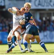 26 October 2014; Darragh Fanning, Leinster, is tackled by Richie Gray and Brice Mach, right, Castres. European Rugby Champions Cup 2014/15, Pool 2, Round 2, Castres Olympique v Leinster. Stade Pierre Antoine, Castres, France. Picture credit: Stephen McCarthy / SPORTSFILE