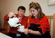 25 April 2007; Special Olympics athlete Aisling O'Brien, from the Blackrock Flyers Club, has a cup of tea poured for her by Margaret Brady, PA to Senator Jim Higgins, MEP, at the Ceann Comhairle's coffee morning in aid of the Special Olympics Support an Athlete campaign which ends on Friday with the Road to China Collection Day. Visit www.eircom.net/specialolympics for details of collection points or to make an online donation. Houses of the Oireachtas, Leinster House, Dublin. Picture credit: Brendan Moran / SPORTSFILE
