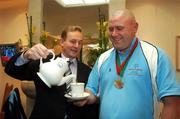 25 April 2007; Special Olympics athlete Joe Nagle, from Mount Argus Basketball Club, Dublin, has a cup of tea poured for him by Fine Gael Leader Enda Kenny, TD, during the Ceann Comhairle's coffee morning in aid of the Special Olympics Support an Athlete campaign which ends on Friday with the Road to China Collection Day. Visit www.eircom.net/specialolympics for details of collection points or to make an online donation. Houses of the Oireachtas, Leinster House, Dublin. Picture credit: Brendan Moran / SPORTSFILE