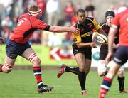 28 April 2007; Aled Brew, Newport Gwent Dragons, is tackled by Mick O'Driscoll, Munster. Magners League, Munster v Newport Gwent Dragons, Musgrave Park, Cork. Picture credit: Brendan Moran / SPORTSFILE