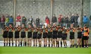 26 October 2014; The Austin Stacks team stand together for the playing of the national anthem. Kerry County Senior Football Championship Final, Austin Stacks v Mid Kerry. Austin Stack Park, Tralee, Co. Kerry. Picture credit: Diarmuid Greene / SPORTSFILE
