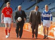 2 May 2007; At the Cadbury All-Ireland U21 Football Final pre-match photocall are captains Andrew O'Sullivan, Cork, left, and Cahir Healy, Laois, with GAA President Nickey Brennan, second from left, and Cathal O Connor, Marketing Manager, Cadbury Ireland. Croke Park, Dublin. Picture credit: Pat Murphy / SPORTSFILE