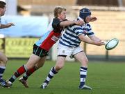 4 May 2007; Andrew Hughes, Dungannon, is tackled by Jonny Lowe, Belfast Harlequins. First Trust Senior Cup Final, Dungannon v Belfast Harlequins, Ravenhill Park, Belfast, Co. Antrim. Picture credit: Oliver McVeigh / SPORTSFILE