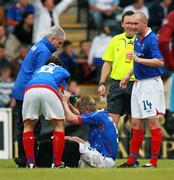 12 May 2007; Linfield's William Murphy waits for medical attention. Setanta Sports Cup Final, Linfield v Drogheda United, Windsor Park, Belfast, Co. Antrim. Picture credit: Russell Pritchard / SPORTSFILE