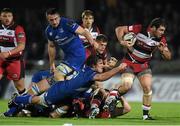 31 October 2014; Tomas Leonardi, Edinburgh, is tackled by Kane Douglas, Leinster. Guinness PRO12, Round 7, Leinster v Edinburgh. RDS, Ballsbridge, Dublin. Picture credit: Pat Murphy / SPORTSFILE