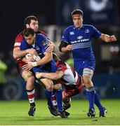 31 October 2014; Zane Kirchner, Leinster, is tackled by Tomas Leonardi, left, and Tom Heathcote, right, Edinburgh. Guinness PRO12, Round 7, Leinster v Edinburgh. RDS, Ballsbridge, Dublin. Picture credit: Stephen McCarthy / SPORTSFILE