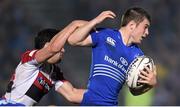 31 October 2014; Luke McGrath, Leinster, is tackled by Sam Hidalgo-Clyne, Edinburgh. Guinness PRO12, Round 7, Leinster v Edinburgh. RDS, Ballsbridge, Dublin. Picture credit: Stephen McCarthy / SPORTSFILE