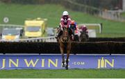 1 November 2014; Road to Riches, with Paul Carberry up, jumps the last on their way to winning the JNwine.com Champion Steeplechase. Down Royal Racecourse, Lisburn, Co. Down. Picture credit: Oliver McVeigh / SPORTSFILE