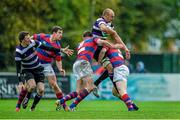 1 November 2014; Kyle McCoy, Terenure, is tackled by Karl Moran, left, and David Joyce, Clontarf. Ulster Bank League, Division 1A, Terenure v Clontarf, Lakelands Park, Terenure, Dublin. Picture credit: Barry Cregg / SPORTSFILE