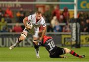 1 November 2014; Roger Wilson, Ulster, is tackled by Angus O'Brien, Newport Gwent Dragons. Guinness PRO12, Round 7, Ulster v Newport Gwent Dragons, Kingspan Stadium, Ravenhill Park, Belfast, Co. Antrim. Picture credit: Oliver McVeigh / SPORTSFILE