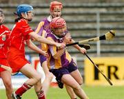 6 May 2007; Michelle Hearne, Wexford, in action against Sara Hayes, Cork. Camogie National League Division 1A Final, Cork v Wexford, Nowlan Park, Co. Kilkenny. Picture credit: Matt Browne / SPORTSFILE