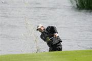19 May 2007; Padraig Harrington, Ireland, plays from the water at the 7th hole during the 3rd Round. Irish Open Golf Championship, Adare Manor Hotel and Golf Resort, Adare, Co. Limerick. Picture credit: Kieran Clancy / SPORTSFILE