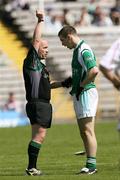 20 May 2007; Barry Owens, Fermanagh, gets a yellow card from referee Martin Duffy. Bank of Ireland Ulster Senior Football Championship Quarter-Final, Fermanagh v Tyrone, St Tighearnach's Park, Clones, Co Monaghan. Picture credit: Oliver McVeigh / SPORTSFILE