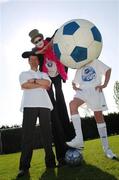 21 May 2007; Photographed ahead of the 2007 Danone Nations Cup Final this weekend is Irish &quot;Godfather&quot; Denis Irwin, ex Republic of Ireland soccer international, with artist Johnny Phelan. The national finals are due to take place here at the AUL Complex, Clonshaugh, Dublin on the 27th May 2007. will provide entertainment throughout the day including a DJ, face painting and prizes for the winners of a penalty shootout with Denis Irwin. Picture credit: David Maher / SPORTSFILE