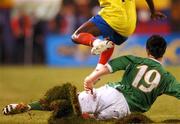 23 May 2007; Shane Long, Republic of Ireland, slides in on Walter Ayovi, Ecuador, as the newly laid pitch cuts up. US Cup, Republic of Ireland v Ecuador, Giants Stadium, Meadowlands Sports Complex, New Jersey, USA. Picture credit: David Maher / SPORTSFILE