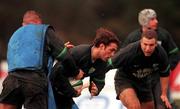 1 February 2000; Kieron Dawson is tackled by Frank Sheahan during an Ireland Rugby training session at Greystones RFC in Wicklow. Photo by Matt Browne/Sportsfile