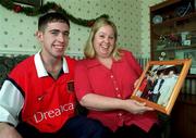 6 January 2000; Republic of Ireland and Arsenal's Stephen Bradley at his home in Jobstown, Tallaght, Dublin, with his mother Bernie holding a picture of Stephen with Liam Brady. Photo by David Maher/Sportsfile
