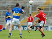 3 June 2007; Pat Dunlea, Cork, in action against Gary Byrne, Tipperary. Munster Junior Football Championship Semi-Final, Cork v Tipperary, Gaelic Grounds, Limerick. Picture credit: Brendan Moran / SPORTSFILE