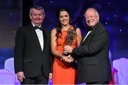 8 November 2014; Sinead Goldrick, Dublin, is presented with her TG4 Ladies Football All-Star Award by Pat Quill, President of the Ladies Gaelic Football Association, in the company of Pól O Gallchóir, left, Ceannsaí, TG4. TG4 Ladies Football All-Star Awards 2014, Citywest Hotel, Saggart, Co. Dublin. Picture credit: Brendan Moran / SPORTSFILE