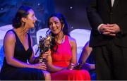 8 November 2014; Sinead Goldrick, right, Dublin, shares a joke with Geraldine O'Flynn, Cork, on stage during the TG4 Ladies Football All-Star Awards 2014, Citywest Hotel, Saggart, Co. Dublin. Picture credit: Ray McManus / SPORTSFILE