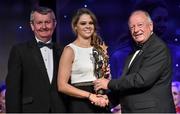 8 November 2014; Noelle Healy, Dublin, is presented with her TG4 Ladies Football All-Star Award by Pat Quill, President of the Ladies Gaelic Football Association, in the company of Pól O Gallchóir, left, Ceannsaí, TG4. TG4 Ladies Football All-Star Awards 2014, Citywest Hotel, Saggart, Co. Dublin. Picture credit: Brendan Moran / SPORTSFILE