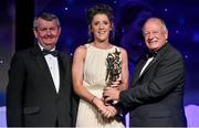 8 November 2014; Ciara O'Sullivan, Cork, is presented with her TG4 Ladies Football All-Star Award by Pat Quill, President of the Ladies Gaelic Football Association, in the company of Pól O Gallchóir, left, Ceannsaí, TG4. TG4 Ladies Football All-Star Awards 2014, Citywest Hotel, Saggart, Co. Dublin. Picture credit: Brendan Moran / SPORTSFILE