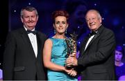 8 November 2014; Aileen Pyers, Down, is presented with her TG4 Ladies Football All-Star Award by Pat Quill, President of the Ladies Gaelic Football Association, in the company of Pól O Gallchóir, left, Ceannsaí, TG4. TG4 Ladies Football All-Star Awards 2014, Citywest Hotel, Saggart, Co. Dublin. Picture credit: Brendan Moran / SPORTSFILE