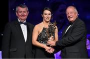 8 November 2014; Sinead Aherne, Dublin, is presented with her TG4 Ladies Football All-Star Award by Pat Quill, President of the Ladies Gaelic Football Association, in the company of Pól O Gallchóir, left, Ceannsaí, TG4. TG4 Ladies Football All-Star Awards 2014, Citywest Hotel, Saggart, Co. Dublin. Picture credit: Brendan Moran / SPORTSFILE