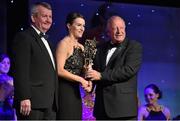 8 November 2014; Sinead Aherne, Dublin, is presented with her TG4 Ladies Football All-Star Award by Pat Quill, President of the Ladies Gaelic Football Association, in the company of Pól O Gallchóir, left, Ceannsaí, TG4. TG4 Ladies Football All-Star Awards 2014, Citywest Hotel, Saggart, Co. Dublin. Picture credit: Ray McManus / SPORTSFILE