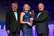 8 November 2014; Vera Foley, Cork, is presented with her TG4 Ladies Football All-Star Award by Pat Quill, President of the Ladies Gaelic Football Association, in the company of Pól O Gallchóir, left, Ceannsaí, TG4. TG4 Ladies Football All-Star Awards 2014, Citywest Hotel, Saggart, Co. Dublin. Picture credit: Brendan Moran / SPORTSFILE