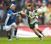 3 June 2007; &quot;Gearing Up for Cúl Camps&quot;. Pictured playing for the Vhi Cúl Camps Team in Croke Park on Sunday are Lauren Nic Aodh Ni Raghallaigh, right, Gaelscoil Taobh na Coille, Co.Dublin, in action against Micheala O'Rourke, Scoil Mhicil Naofa, Athy, Co. Kildare. Bank of Ireland Leinster Senior Football Championship, Meath v Dublin, Croke Park, Dublin. Picture Credit: David Maher / SPORTSFILE